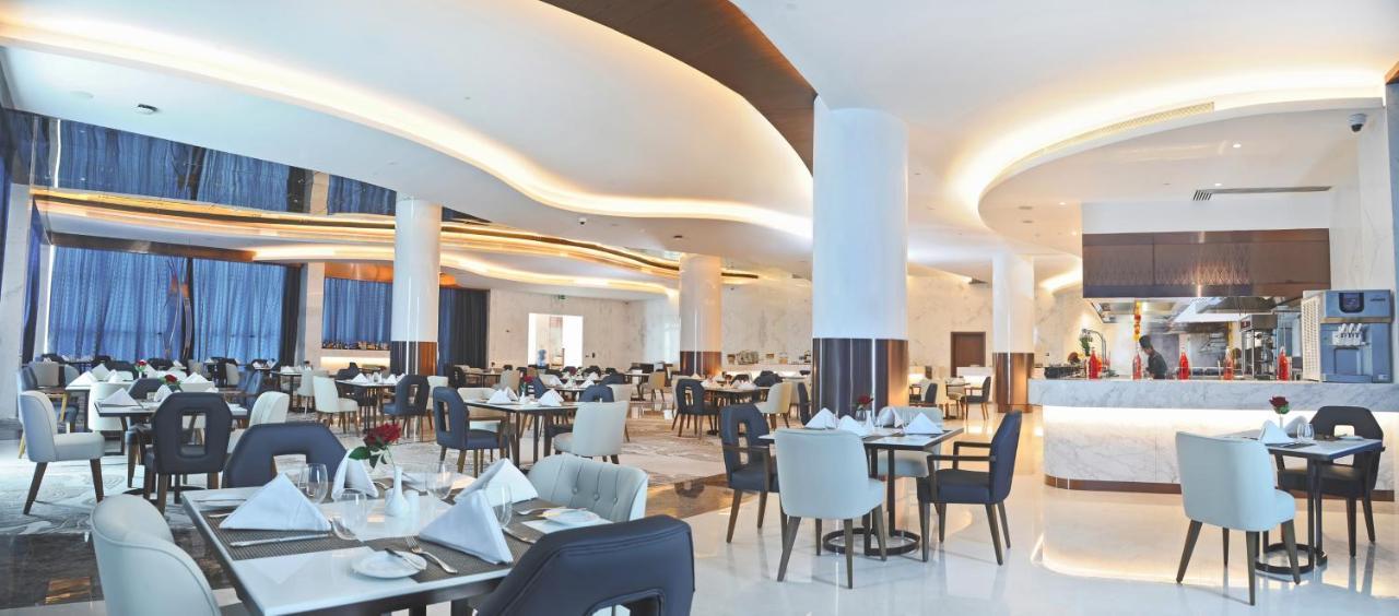 Royal M Al Aqah Beach Resort By Gewan Екстер'єр фото The restaurant