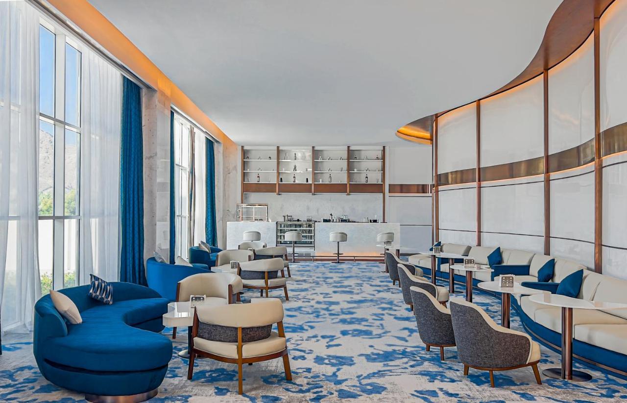 Royal M Al Aqah Beach Resort By Gewan Екстер'єр фото The Lounge at the airport