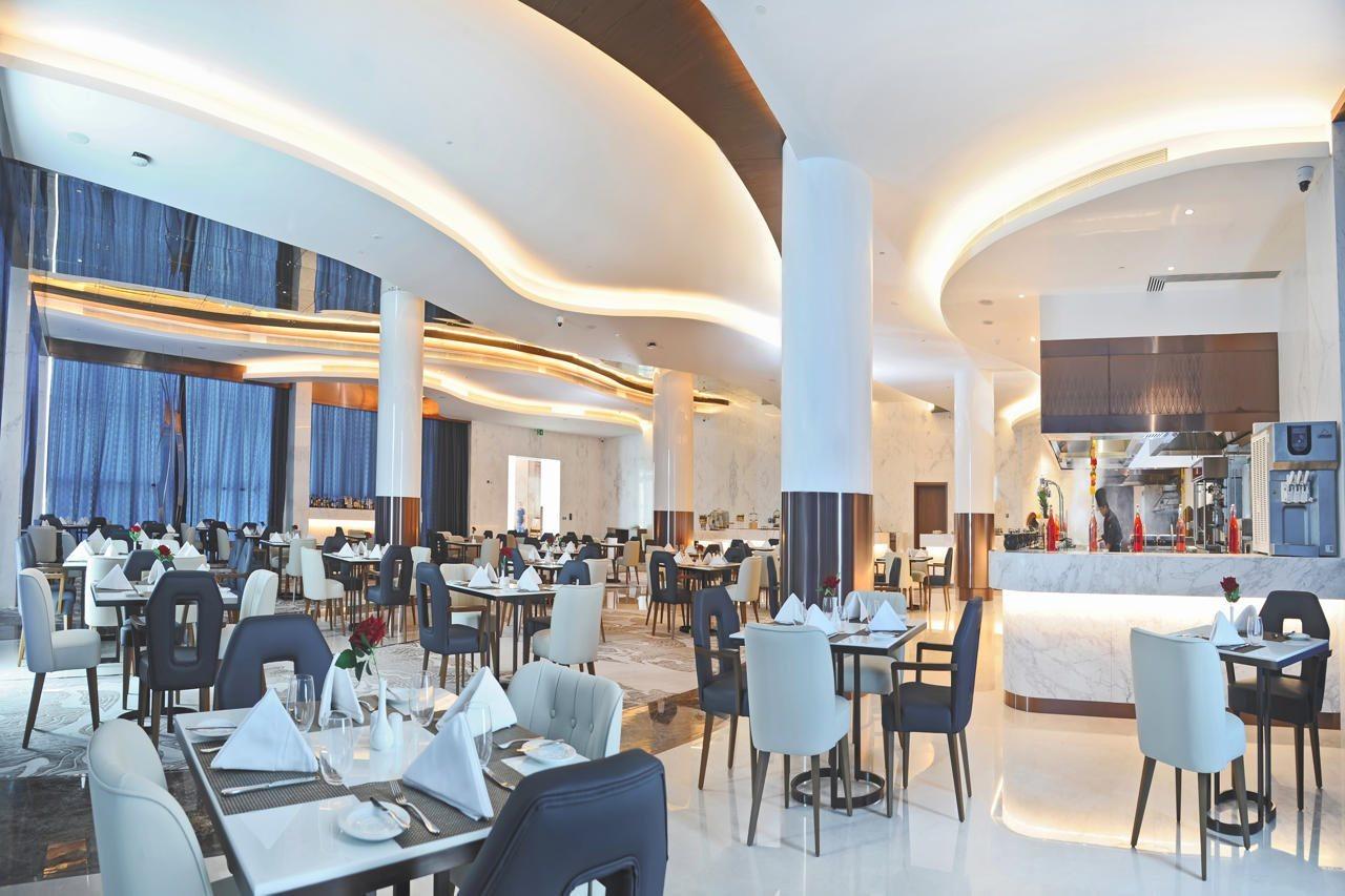 Royal M Al Aqah Beach Resort By Gewan Екстер'єр фото The restaurant